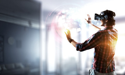 Experiencing virtual technology world. Mixed media