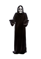 Halloween costume of a skeleton grim reaper wearing a black robe on a white background presenting...