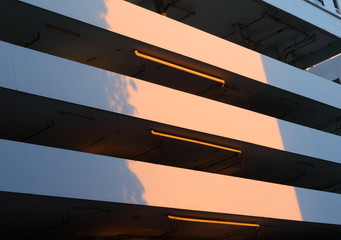 outside view of parking area of a high building with sunlight