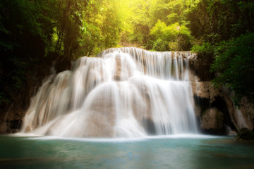 Fototapeta na wymiar Huay MaeKamin Waterfall is beautiful waterfall in tropical forest, Kanchanaburi province, Thailand.