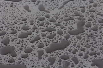 Water drops and splashes on black background