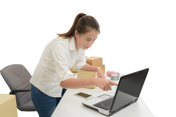 teenager owner business woman work at home with laptop for online shopping writing the order