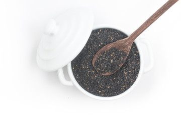 Black sesame in a bowl and spoon