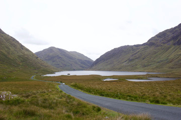 Landscape view of beautiful and tranquil Doo Lough Valley and lake in the Connemara region of...