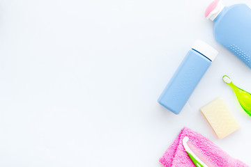 Children's personal care kit. Bath accessories with teeth brush on white background top view space for text