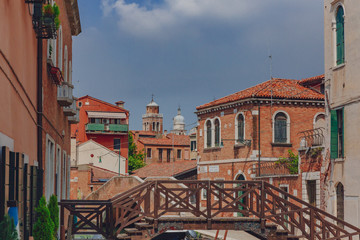 Obraz premium Venetian houses and bridge in Venice, Italy