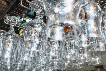 Glass glasses hung from the bar