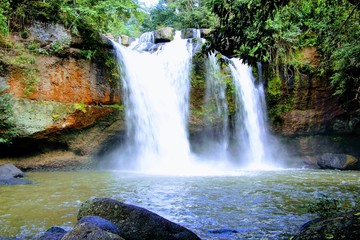 Haew Suwat Waterfall refreshing in the morning at Khao Yai National Park, Nakhon Ratchasima, Thailand in the morning. 