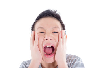 Asian teenager with acne on his face screaming isolated over white background