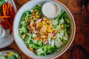 Salad dressing and sauces on the table.