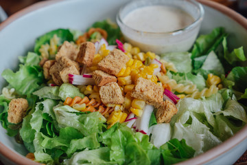Salad dressing and sauces on the table.