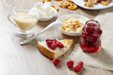 jam in wooden dish on wooden table