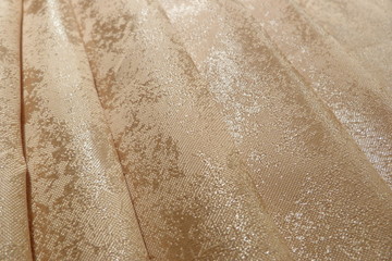golden shiny fabric close-up macro background decor brocade silk organza textile