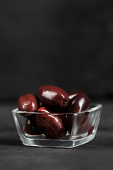 red olives in glass containers