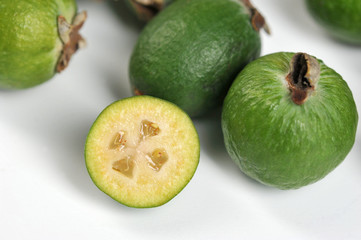 Fototapeta na wymiar feijoa fruits whole and cut