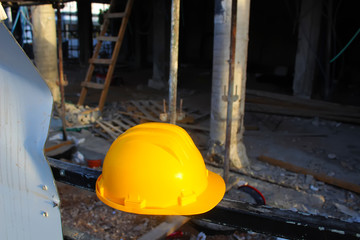 Helmet Construction Worker (Engineer) on the background of a building under construction. Israel Construction Site. Israel Construction Industry