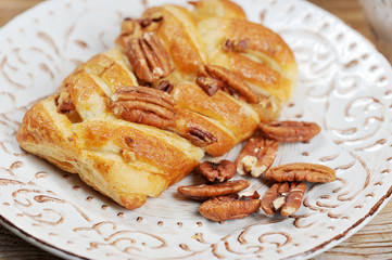 bun with pecan and coffee