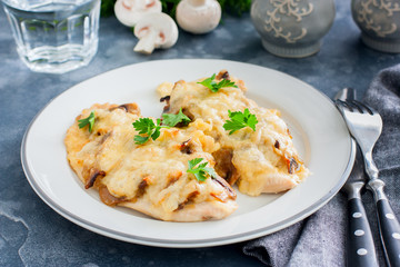 Chicken fillet breast with cheese and mushrooms, selective focus