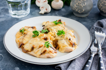 Chicken fillet breast with cheese and mushrooms, selective focus