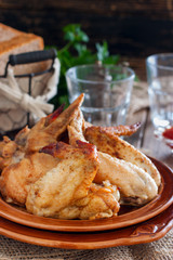 Cooked chicken wings, selective focus