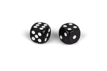 Two black dice isolated on a white background. Six and four.