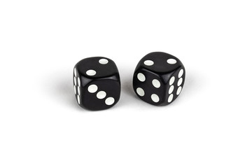 Two black dice isolated on a white background. Two and two