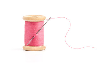 Old wooden coil of thread.