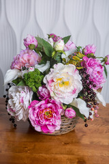 Still life with Bouquet of summer flowers in basket