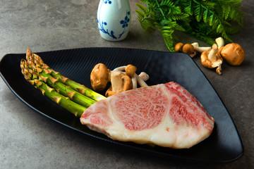 Premium Kobe beef with asparagus and mushrooms