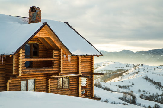 house in the snowy mountains