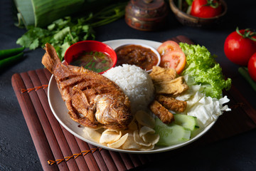 traditional malay indonesian tilapia fish rice