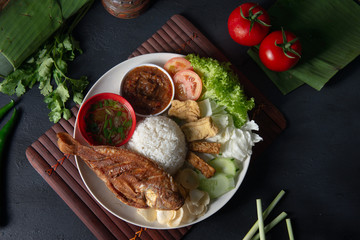 traditional malay indonesian tilapia fish rice