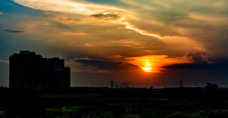 Fototapeta premium Orange sky at sunset in Delhi NCR