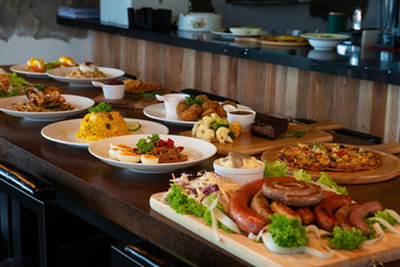 Mixed western and fusion food plates on table