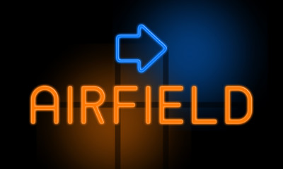 Airfield - orange glowing text with an arrow on dark background