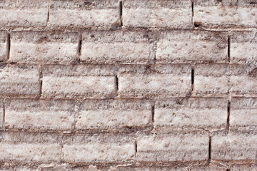 Salt bricks are a local and simple choice for construction material.