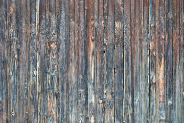 Image of the wall of an old wooden house.