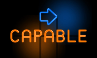 Fototapeta premium Capable - orange glowing text with an arrow on dark background