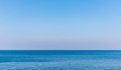 Fototapeta na wymiar Perfect on blue sky over ocean background.