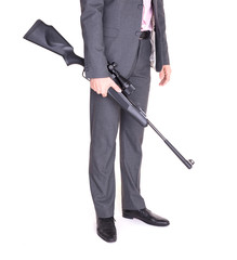 Man in suit with gun, rifle