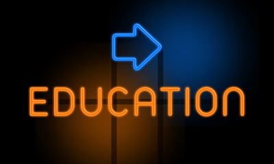 Education - orange glowing text with an arrow on dark background