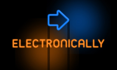 Electronically - orange glowing text with an arrow on dark background