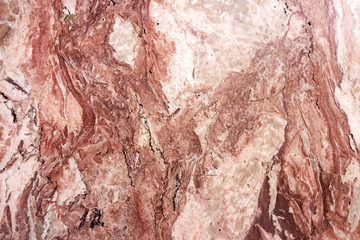 Multicolored layered marble texture with different veins and scratches, may be used as background