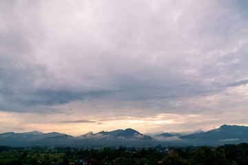 Landscape of Mountain with clouds in morning time.