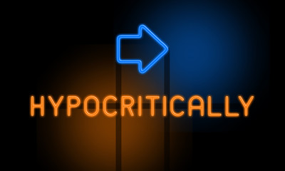 Hypocritically - orange glowing text with an arrow on dark background