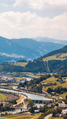 Fototapeta na wymiar Smartphone HD wallpaper of alpine view at Castle Hohenwerfen