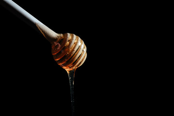 honey poured into a jar