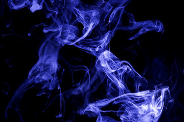 Blue smoke on black background