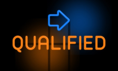 Qualified - orange glowing text with an arrow on dark background
