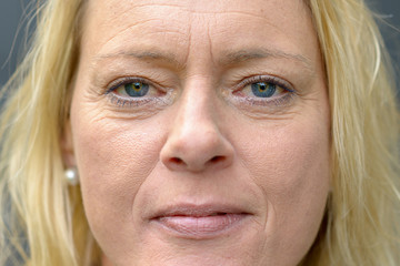 Close up face portrait of a middle-aged woman